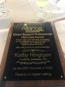 Photo of the plaque awarded to Kathy for her exemplary work with individuals who have disabilities